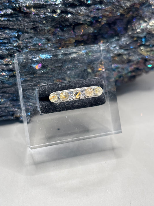 Goldener Rutil Ring im Tennisdesign